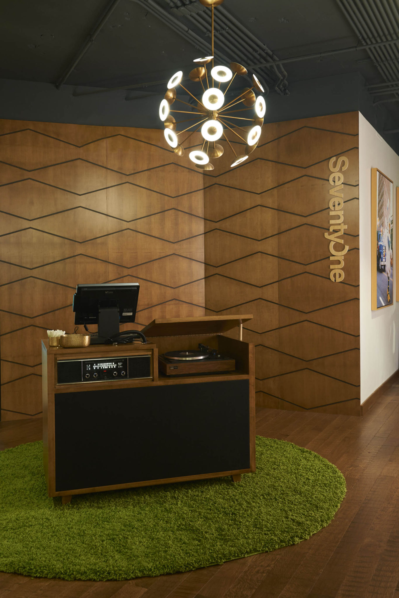 SeventyOne record station, custom light fixture, and dimensional identity